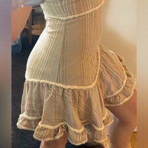 Indikah Beige Textured Baby Doll Ruffled Dress